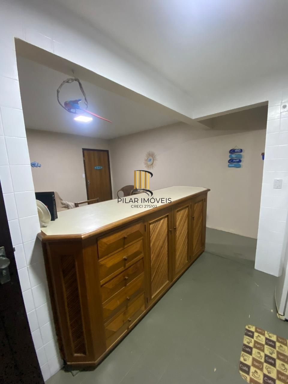 Apartamento com 2 dormitórios e garagem em Torres