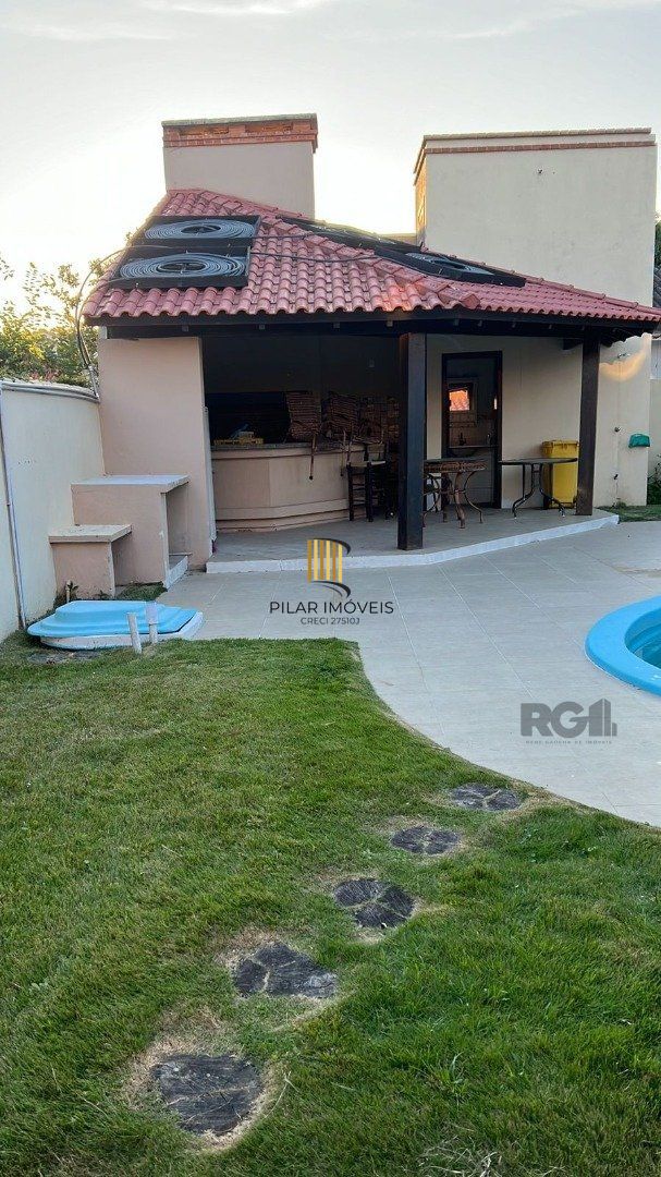 Casa 5 dormitórios no bairro Atlântida