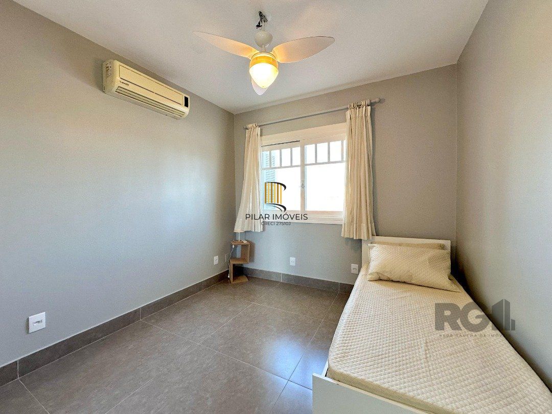 Casa de Condomínio 4 dormitórios no bairro Atlântida