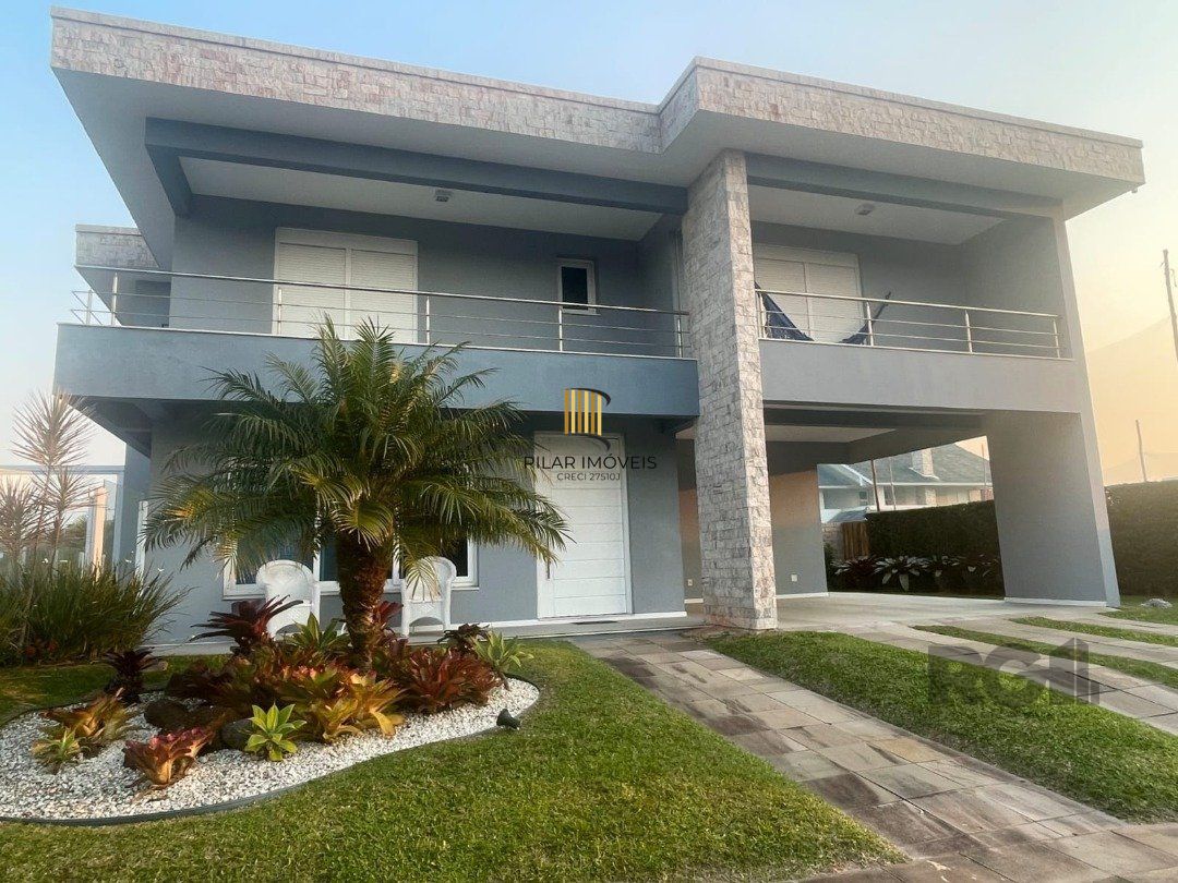 Casa de Condomínio 5 dormitórios no bairro Atlântida Sul - Pilar Imóveis