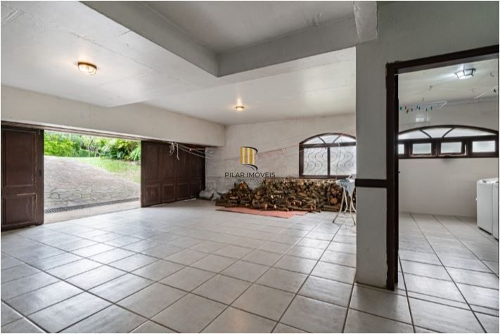 Casa em Condomínio à venda com 5 dormitórios, 565m² e 4 vagas no Condominio Jardim do Sol, Zona Sul de Porto Alegre