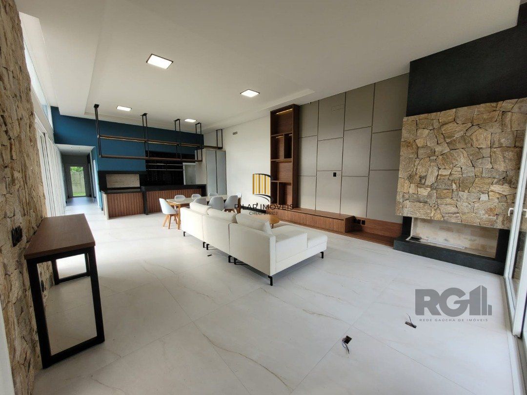 Casa de Condomínio 4 dormitórios no bairro Atlântida
