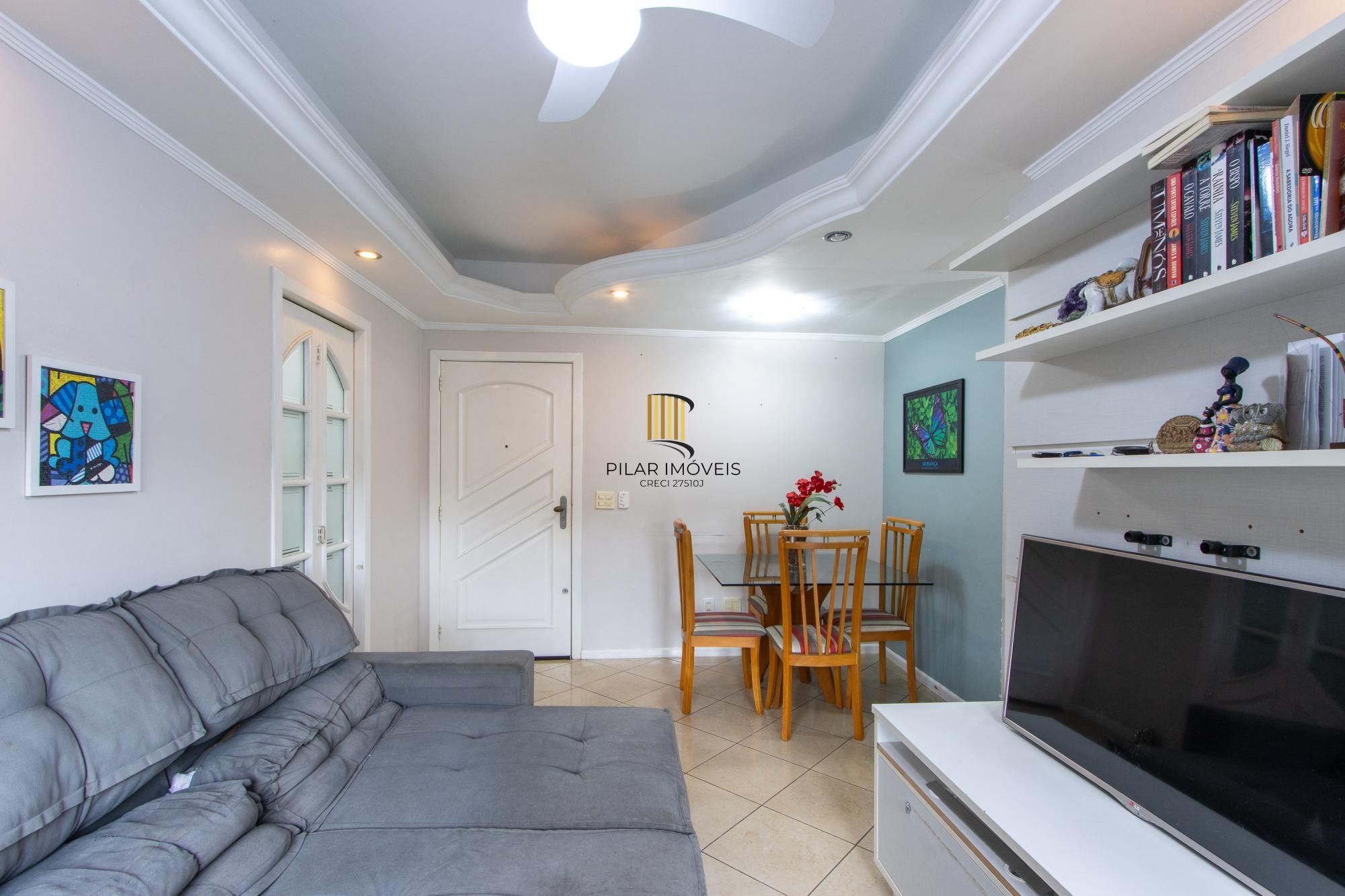 Apartamento de 2 quartos, living, cozinha planejada, área de serviço e 1 vaga.