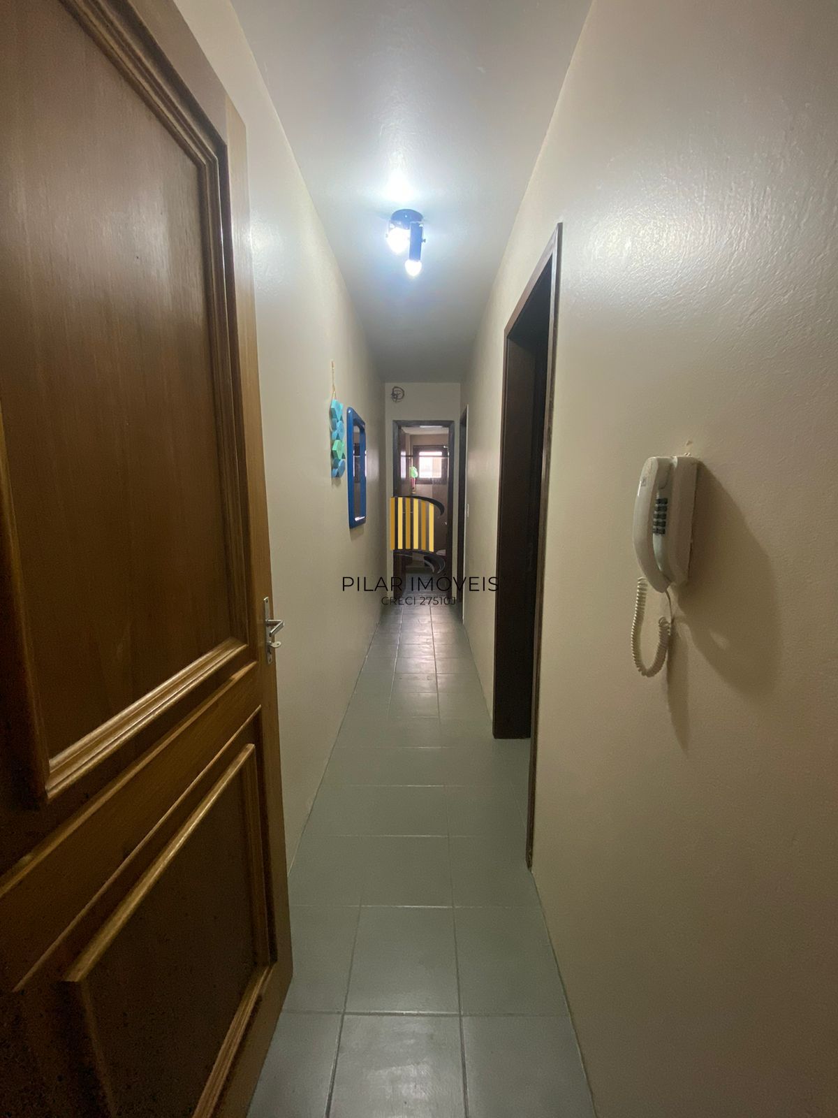 Apartamento com 2 dormitórios e garagem em Torres