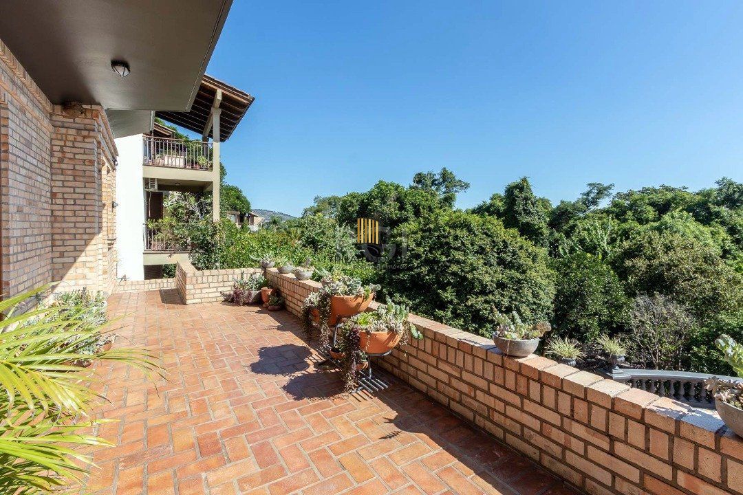 Casa Condominio para Venda - 559m², 4 dormitórios, sendo 3 suites, 3 vagas - Cavalhada