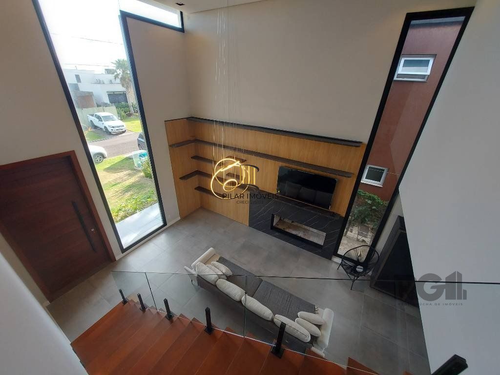 Casa de Condomínio 4 dormitórios no bairro Rainha do Mar