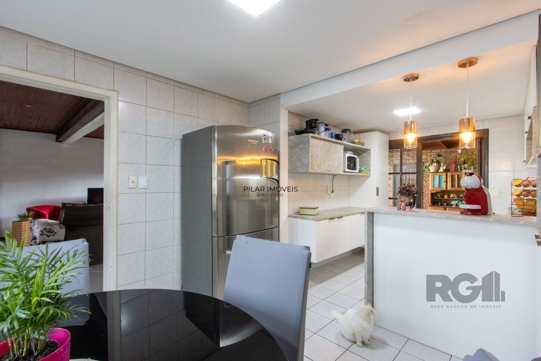 Casa 3 dormitórios no bairro Camaquã