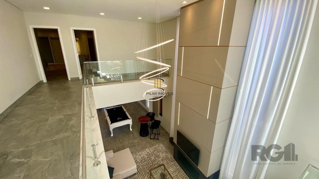 Casa de Condomínio 5 dormitórios no bairro Atlântida Sul