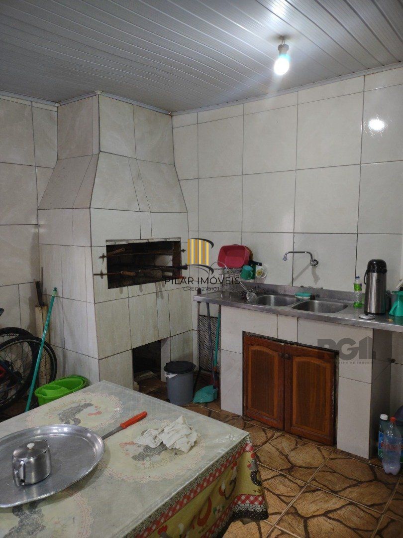 Casa 3 dormitórios no bairro Camaquã