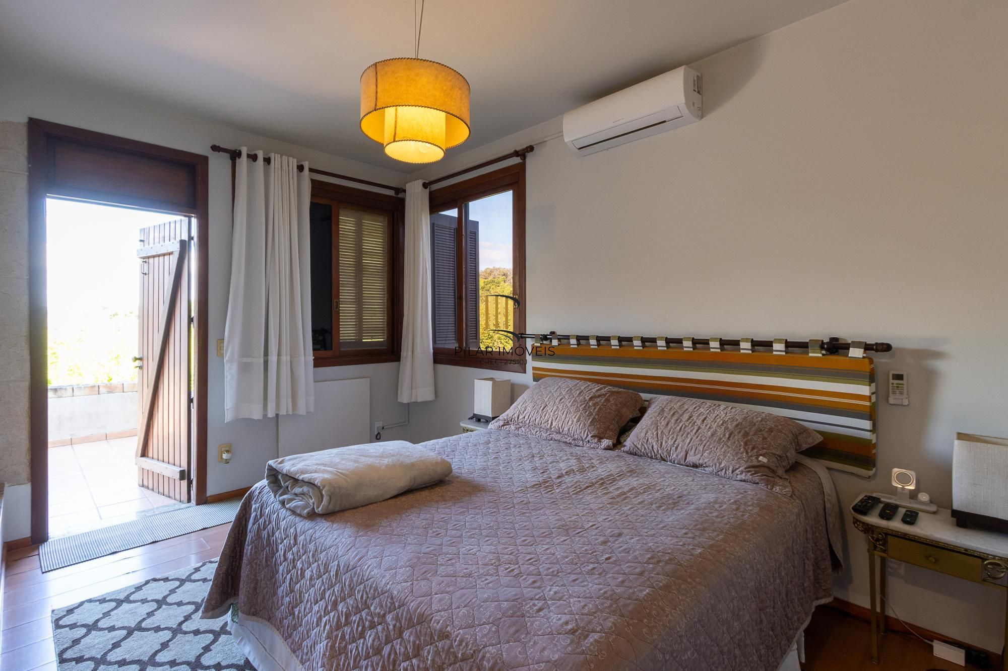 Casa em condomínio á venda com 6 dormitórios em Porto Alegre