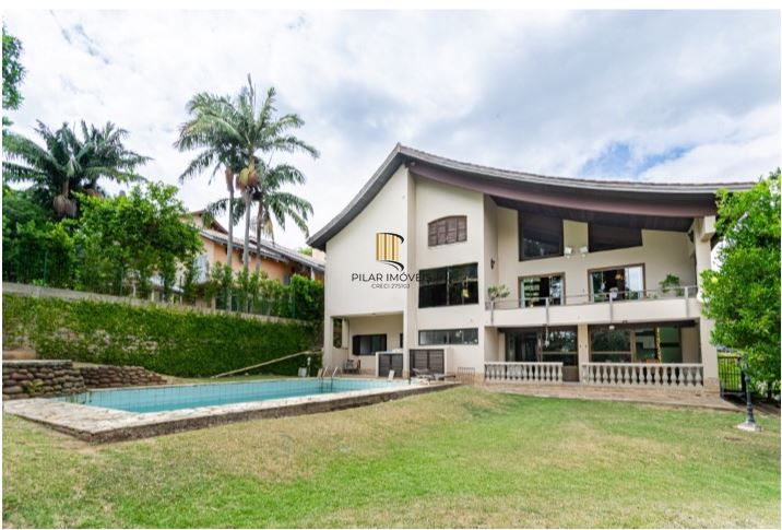 Casa em Condomínio à venda com 5 dormitórios, 565m² e 4 vagas no Condominio Jardim do Sol, Zona Sul de Porto Alegre