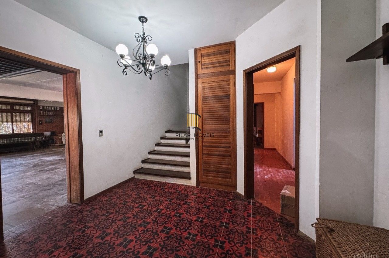 Casa bairro Sétimo Céu, 463m² privativos, vista privilegiada do Rio Guaíba em terreno de 1.423m².