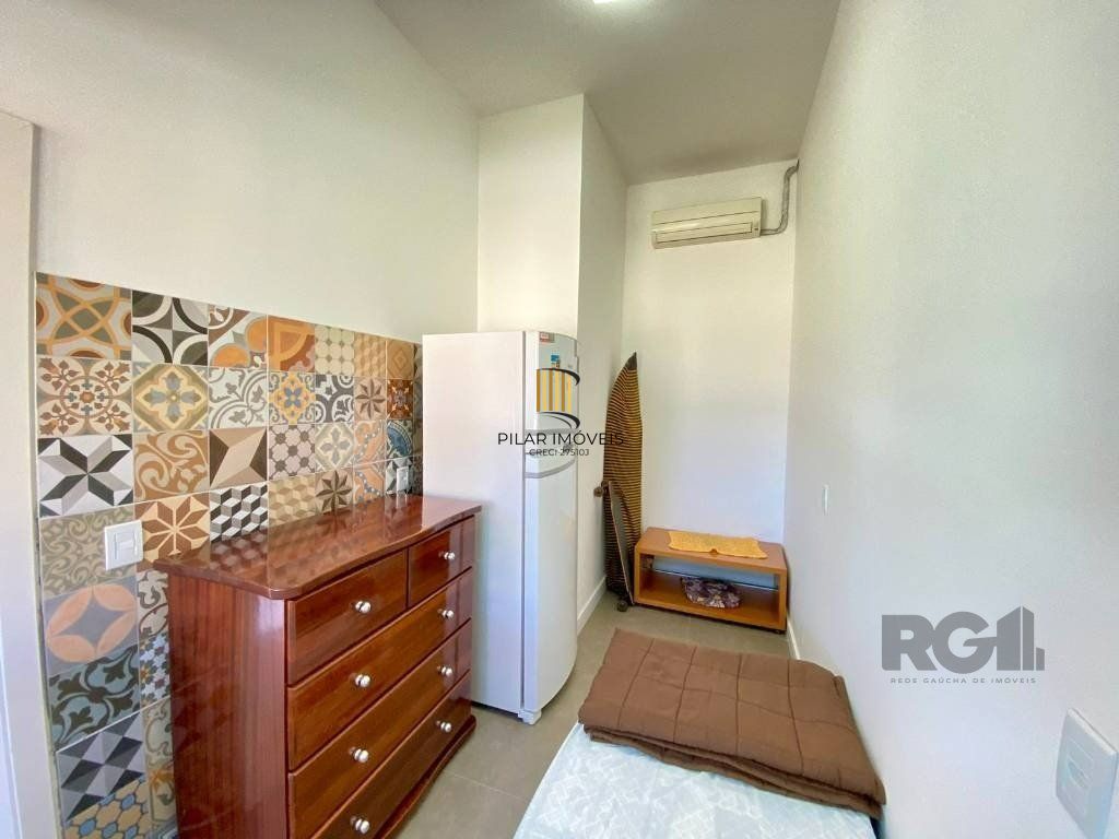 Casa a venda em Condomínio fechado na Beira mar de Atlântida Sul com 3 quartos e 164m²