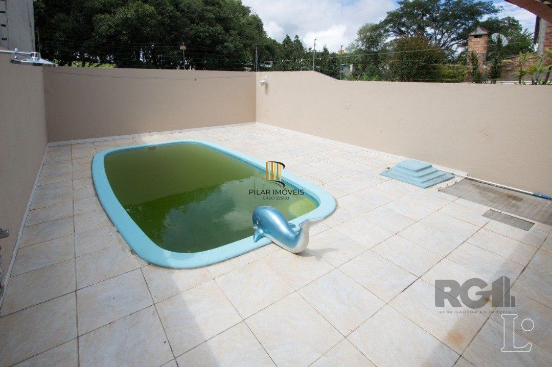 Casa 3 dormitórios no bairro Hípica