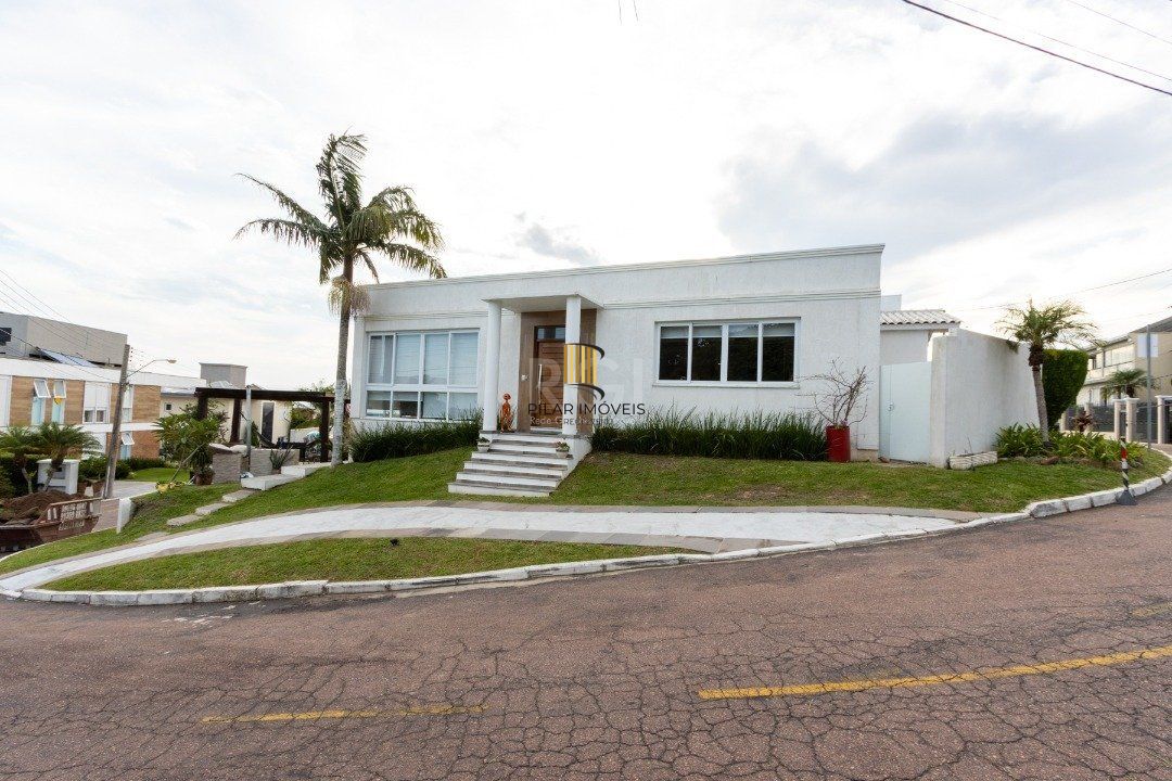 Casa de Condomínio 6 dormitórios no bairro Nonoai - Pilar Imóveis