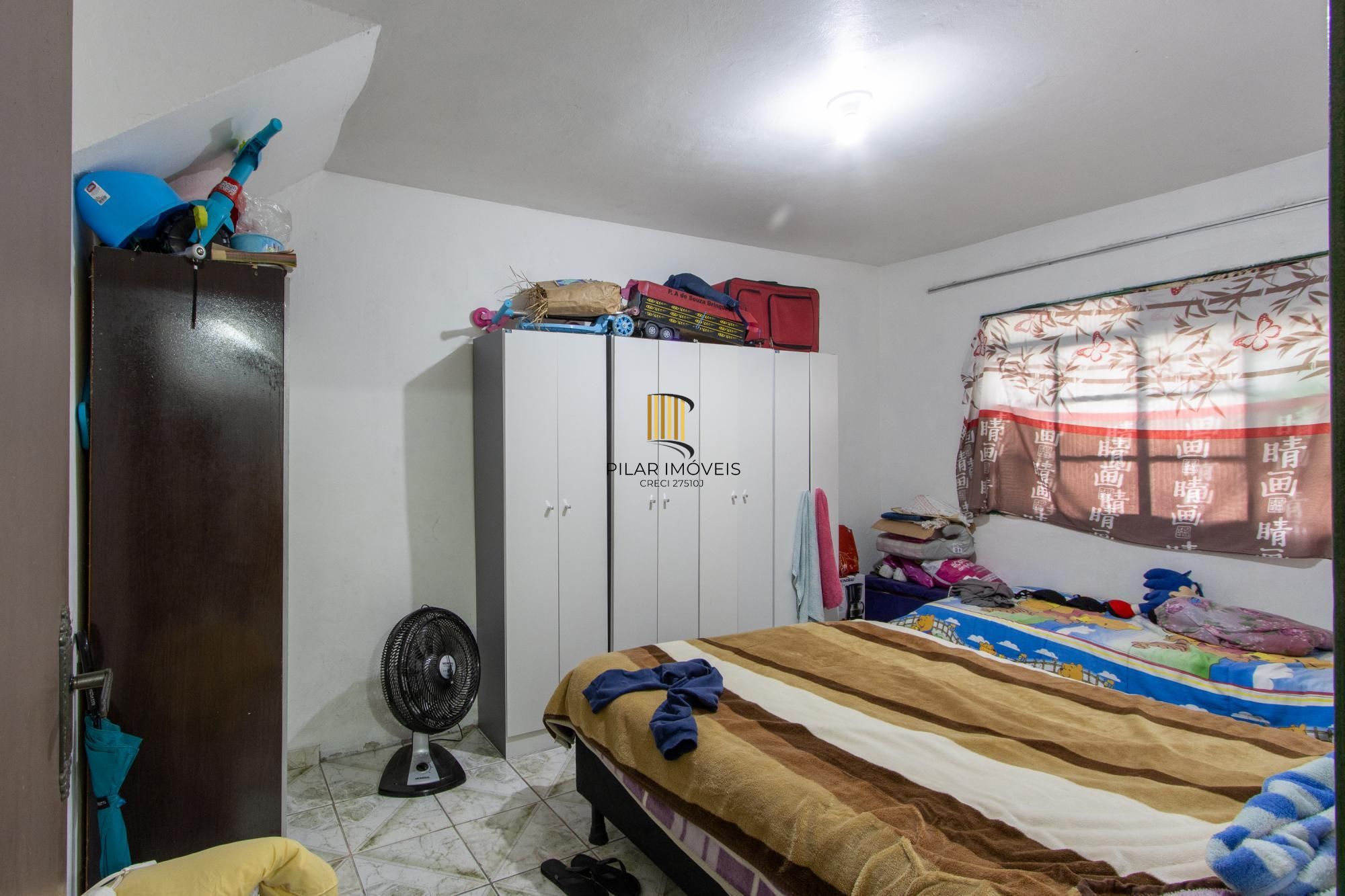 Casa ampla de 2 pavimentos com 4 dormitórios, 1 suite e 4 vagas no bairro Santa Tereza!