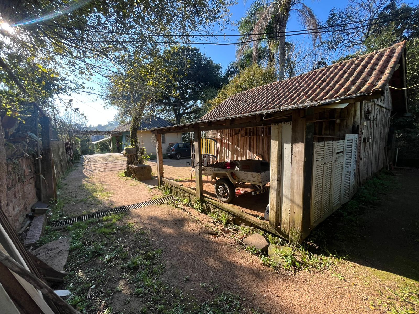 Terreno Amplo com 3 Casas – Vila Nova, Porto Alegre