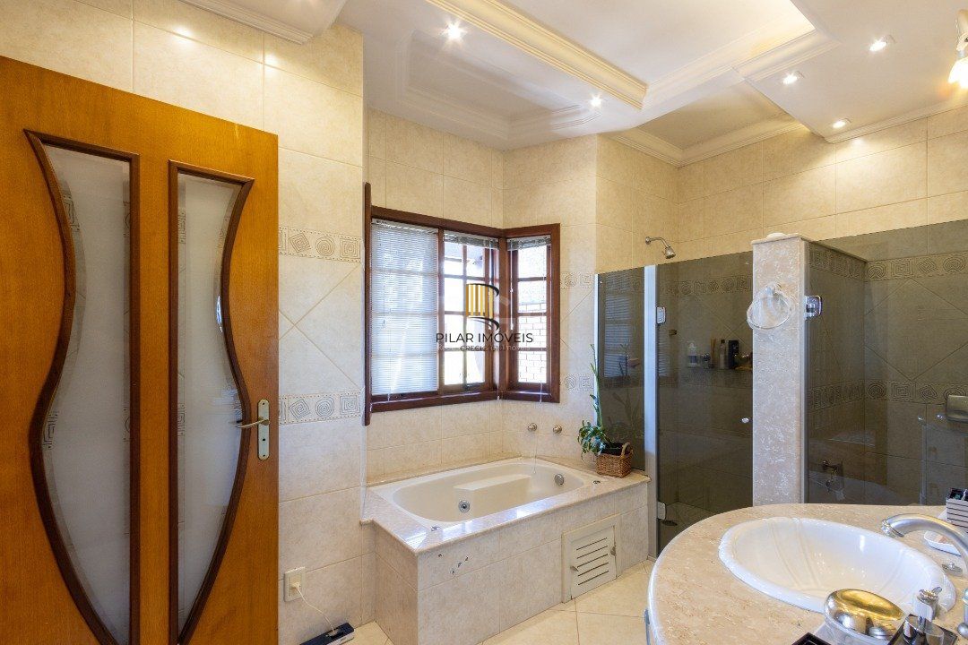 Casa de Condomínio 4 dormitórios no bairro Nonoai