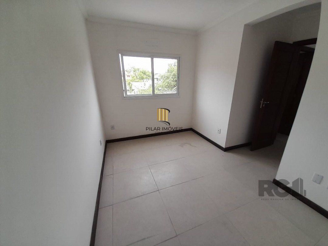 Casa de Condomínio 3 dormitórios no bairro Camaquã
