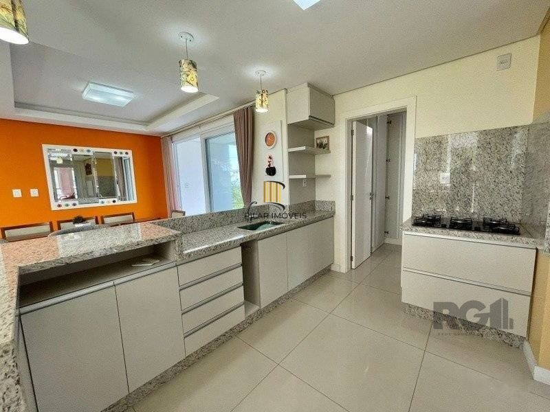 Casa de Condomínio 4 dormitórios no bairro Atlântida Sul