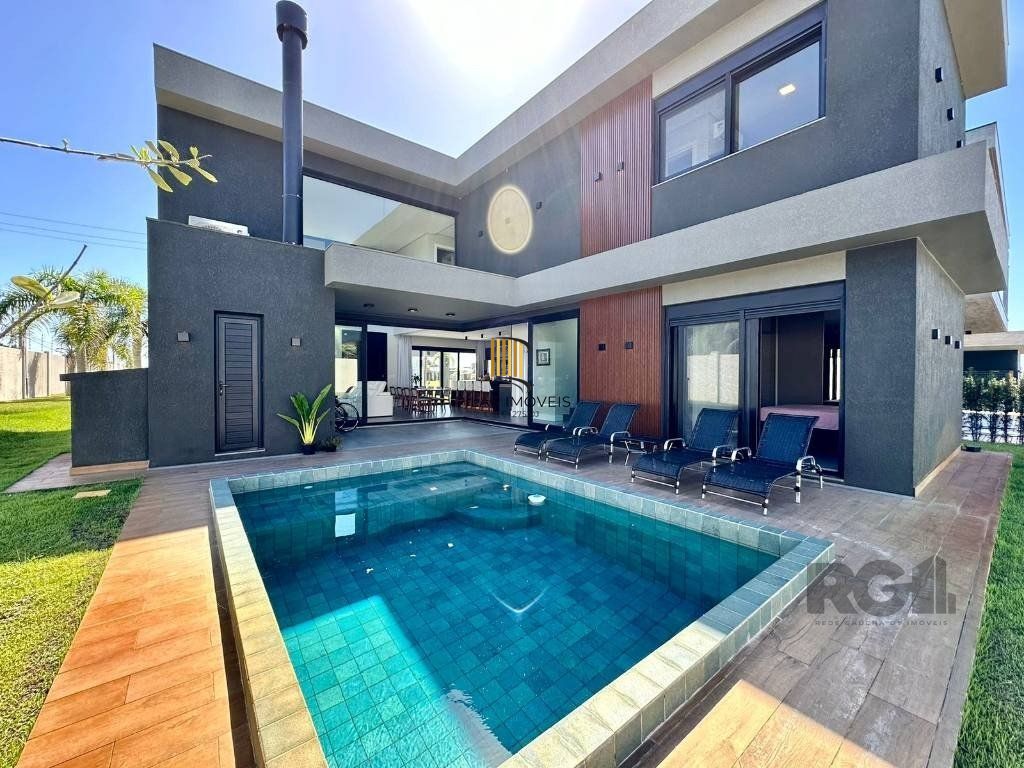 Casa de Condomínio 4 dormitórios no bairro Capão Novo