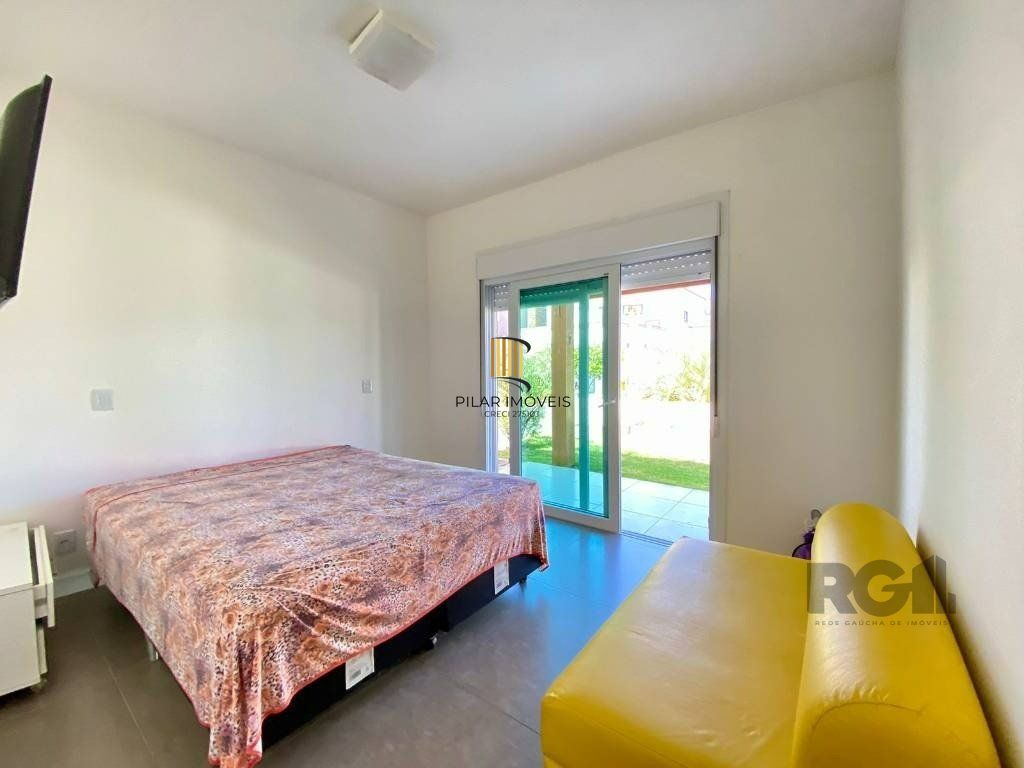 Casa a venda em Condomínio fechado na Beira mar de Atlântida Sul com 3 quartos e 164m²