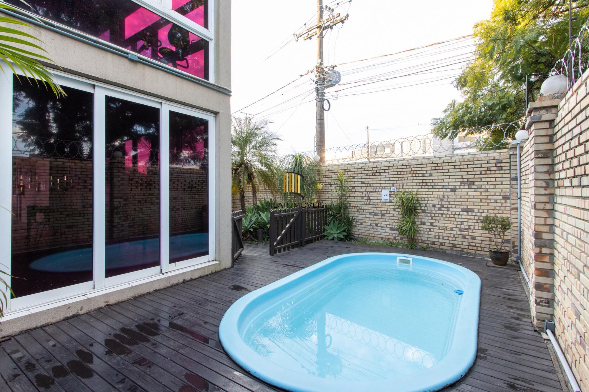 Casa de Condomínio 3 dormitórios no bairro Cavalhada