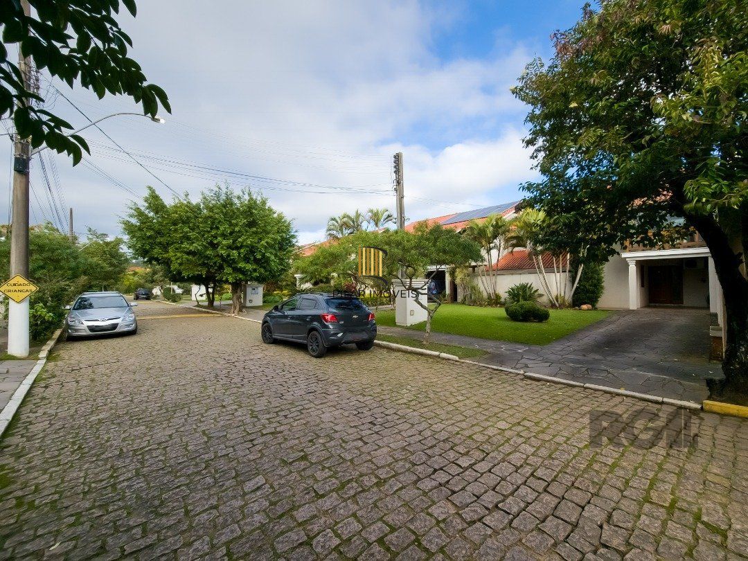 Casa de Condomínio 3 dormitórios no bairro Cavalhada