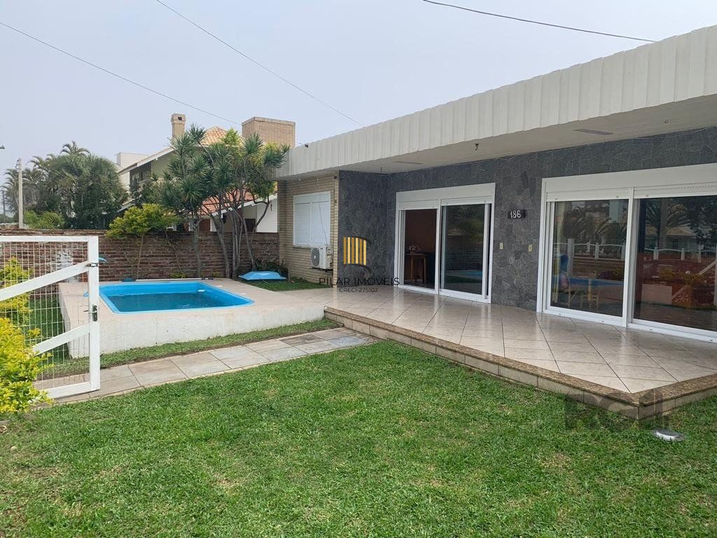 Casa com 6 dormitórios em Atlântida