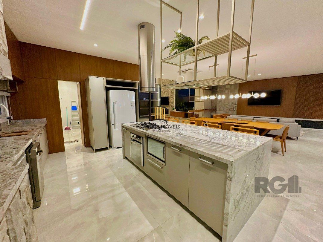 Sobrado Beira Lago com piscina e Deck com 457m² e 5 suítes no Condomínio Sense em Xangri-lá