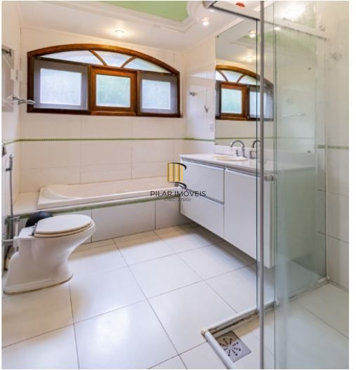 Casa em Condomínio à venda com 5 dormitórios, 565m² e 4 vagas no Condominio Jardim do Sol, Zona Sul de Porto Alegre