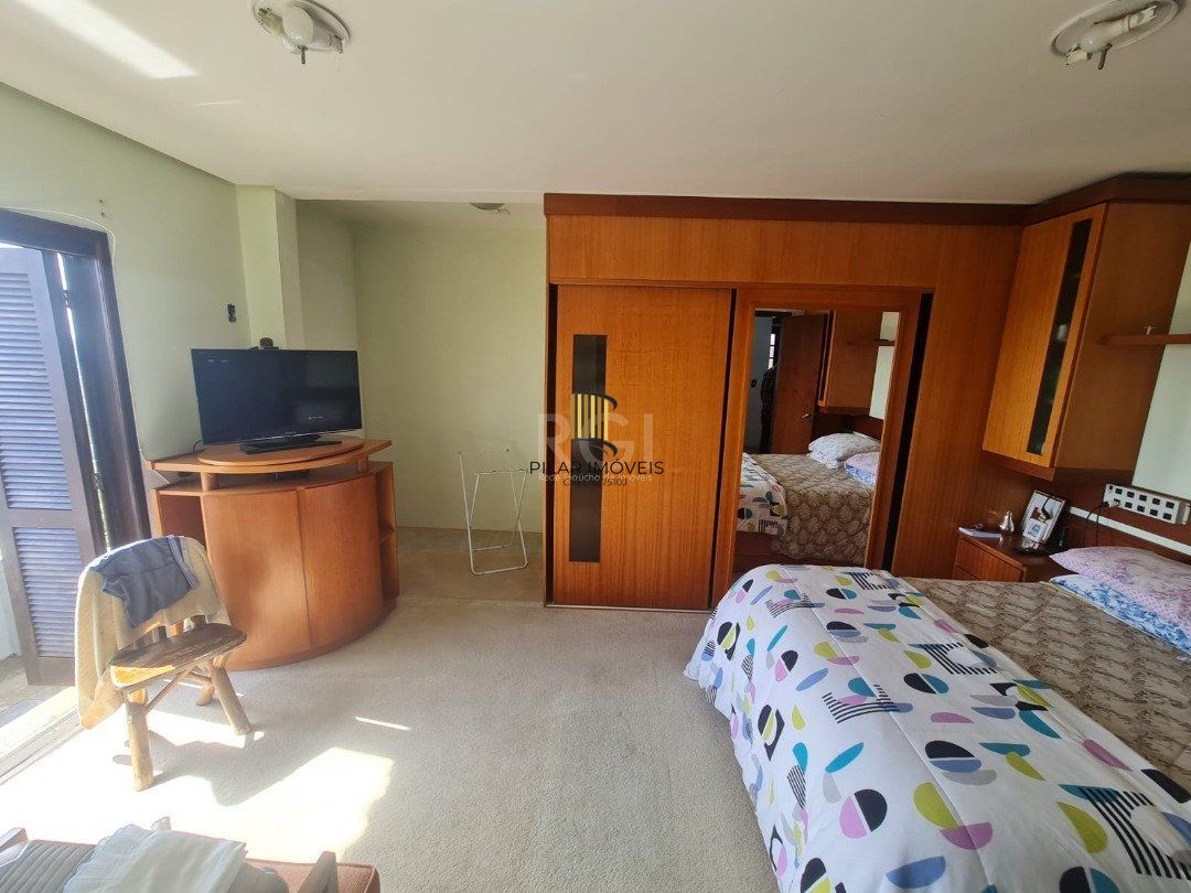 Casa para Venda - 464m², 5 dormitórios, sendo 4 suites, 4 vagas - Nonoai