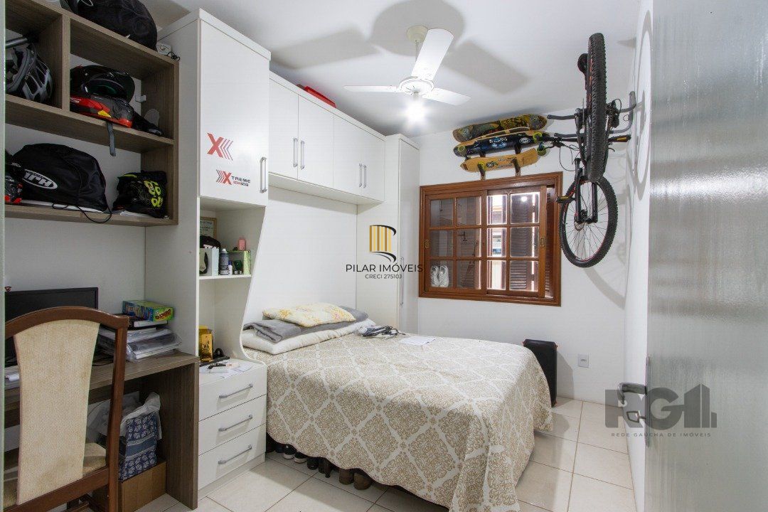 Casa de Condomínio 3 dormitórios no bairro Camaquã
