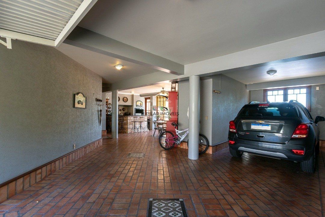 Casa Condominio para Venda - 559m², 4 dormitórios, sendo 3 suites, 3 vagas - Cavalhada