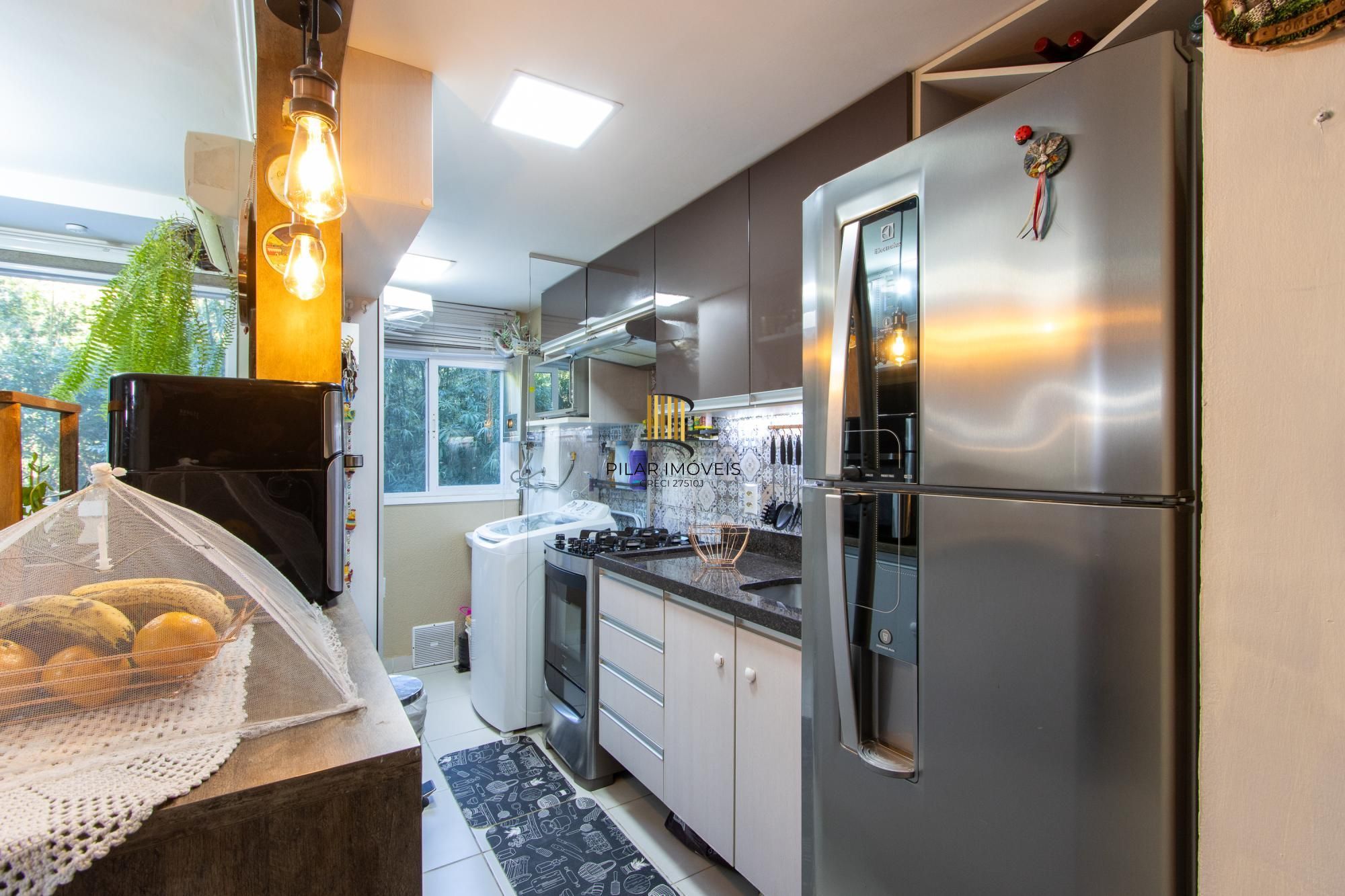 Apartamento  com  2 dormitórios, cozinha americana, Banheiro social, gás central, 1 vaga