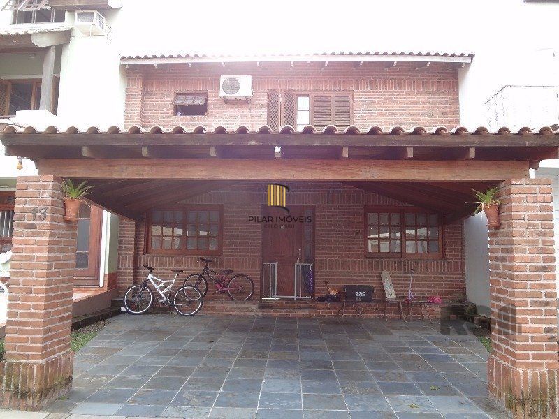 Casa de Condomínio 3 dormitórios no bairro Cavalhada