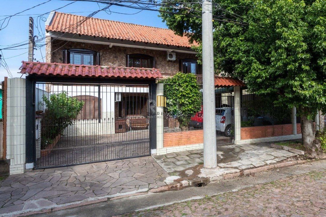 Casa para Venda - 300m², 5 dormitórios, 2 vagas - Cavalhada - Pilar Imóveis