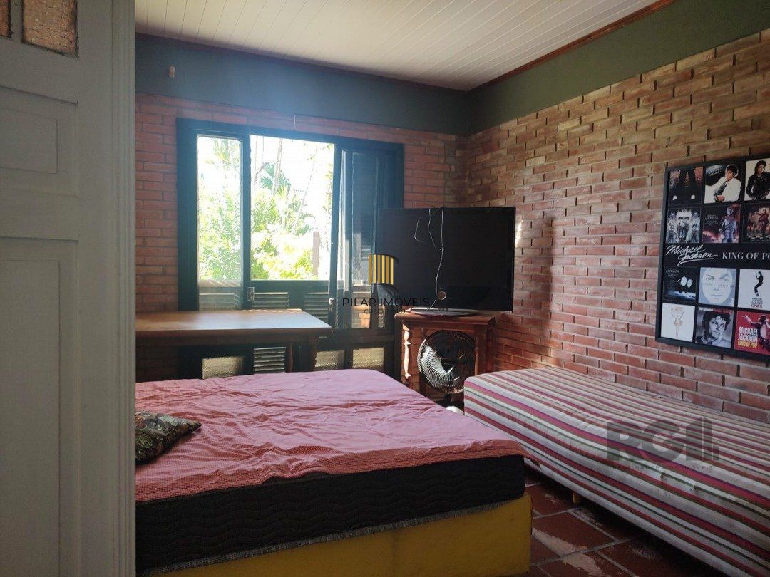 Casa 5 dormitórios no bairro Atlântida