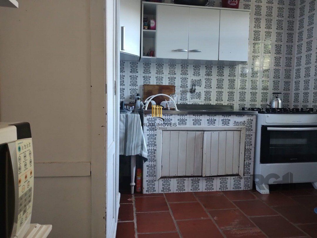 Casa 5 dormitórios no bairro Atlântida