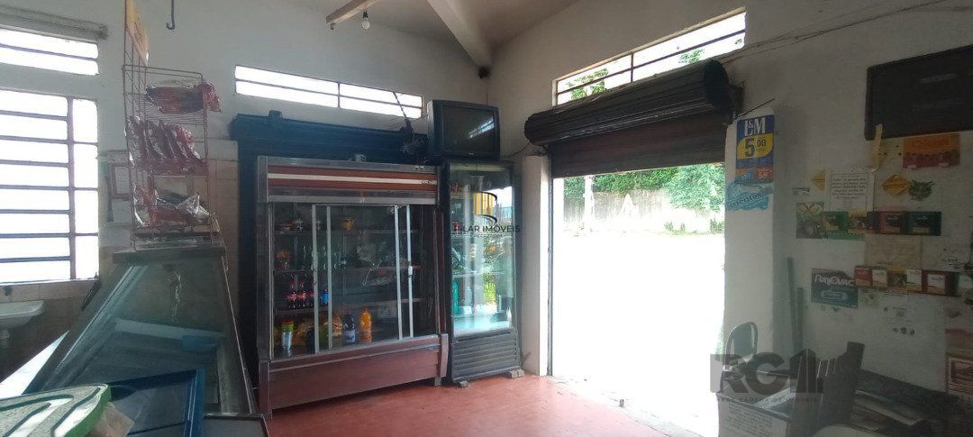 Casa de 3 dormitórios com piscina no Bairro Cristal.