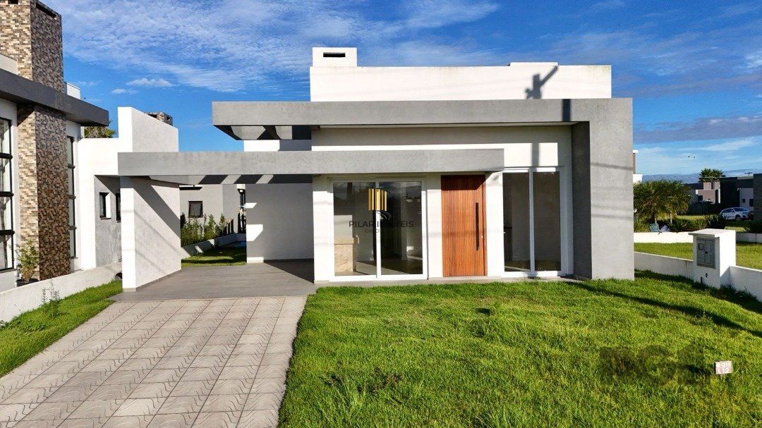 Casa de Condomínio 3 dormitórios no bairro Dubai