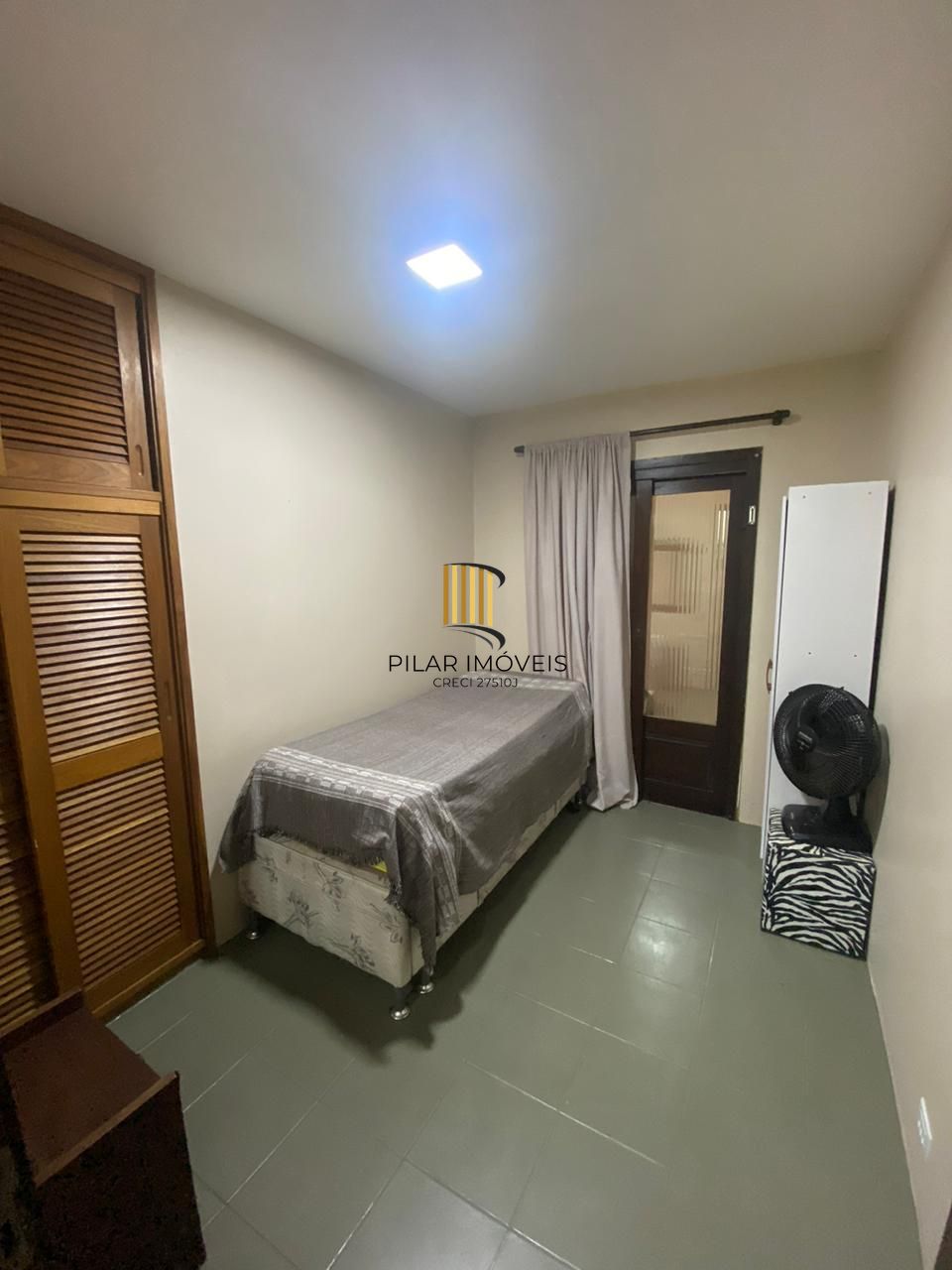 Apartamento com 2 dormitórios e garagem em Torres