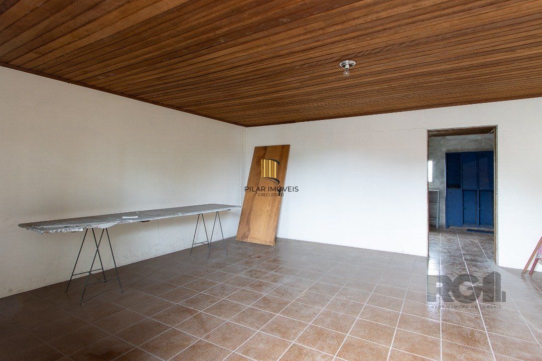Casa 5 dormitórios no bairro Ipanema