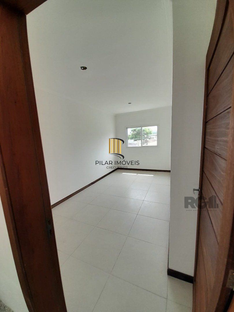 Casa 3 dormitórios no bairro Camaquã