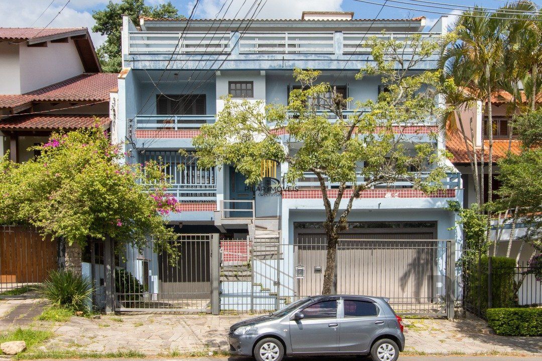 Casa 4 dormitórios no bairro Nonoai - Pilar Imóveis