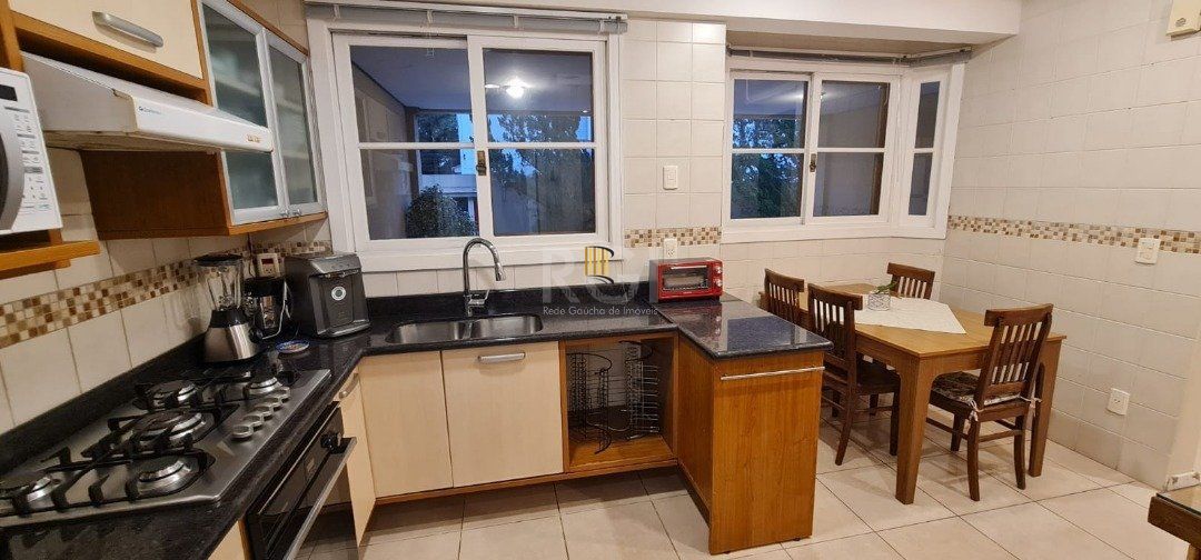 Casa de Condomínio 4 dormitórios no bairro Vila Conceição