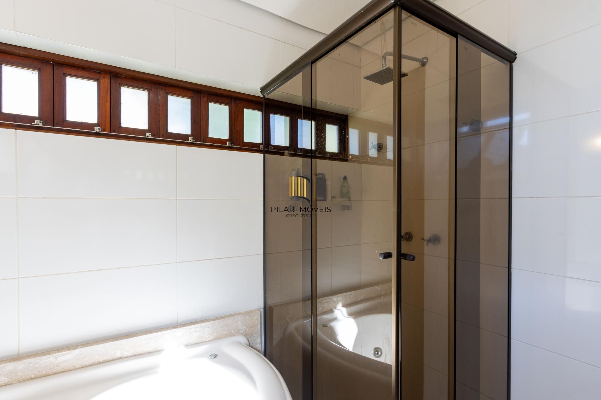 Casa de Condomínio 4 dormitórios no bairro Cavalhada