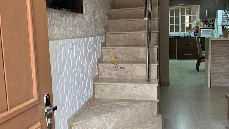 Casa 5 dormitórios no bairro Jardim Algarve