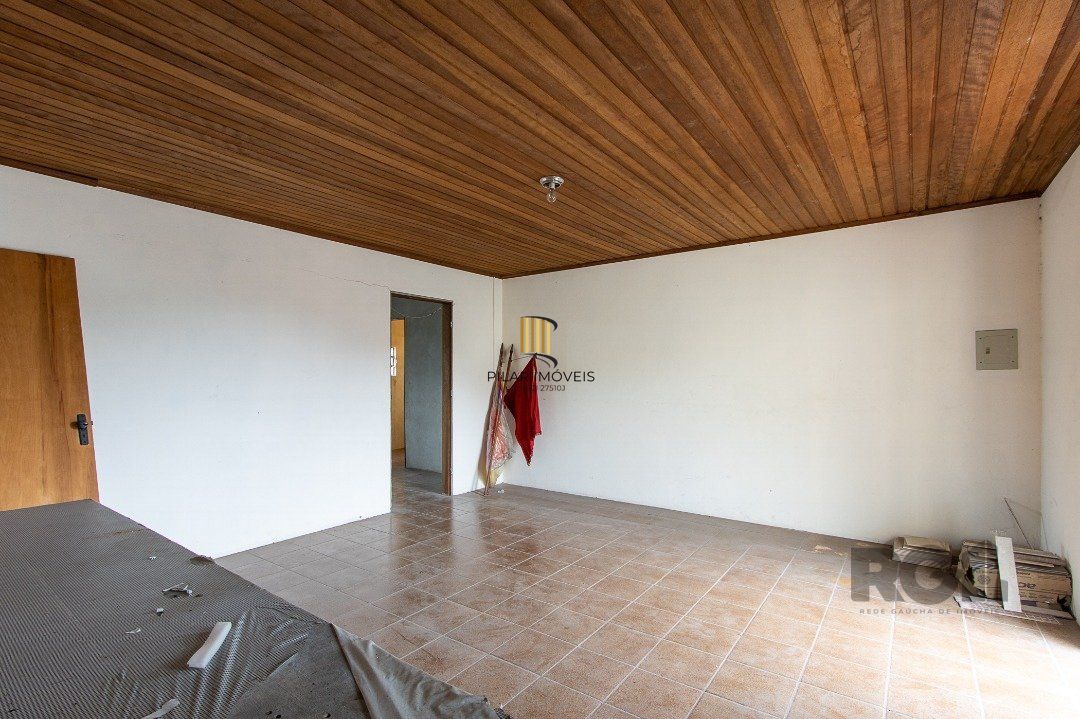 Casa 5 dormitórios no bairro Ipanema