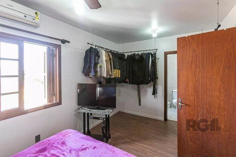 Casa com 161m² e 3 dormitórios com suíte, piscina no bairro Espírito Santo em PORTO ALEGRE